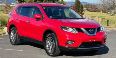 2017 red Nissan X-Trail