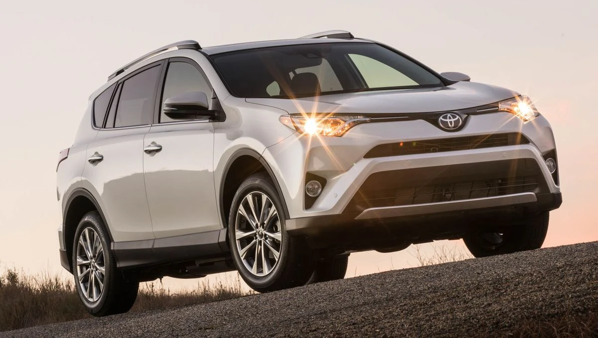 An image of the Toyota RAV 4 with headlights on