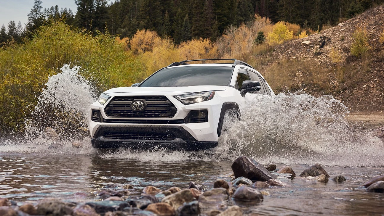 An image of Toyota RAV 4 traversing water