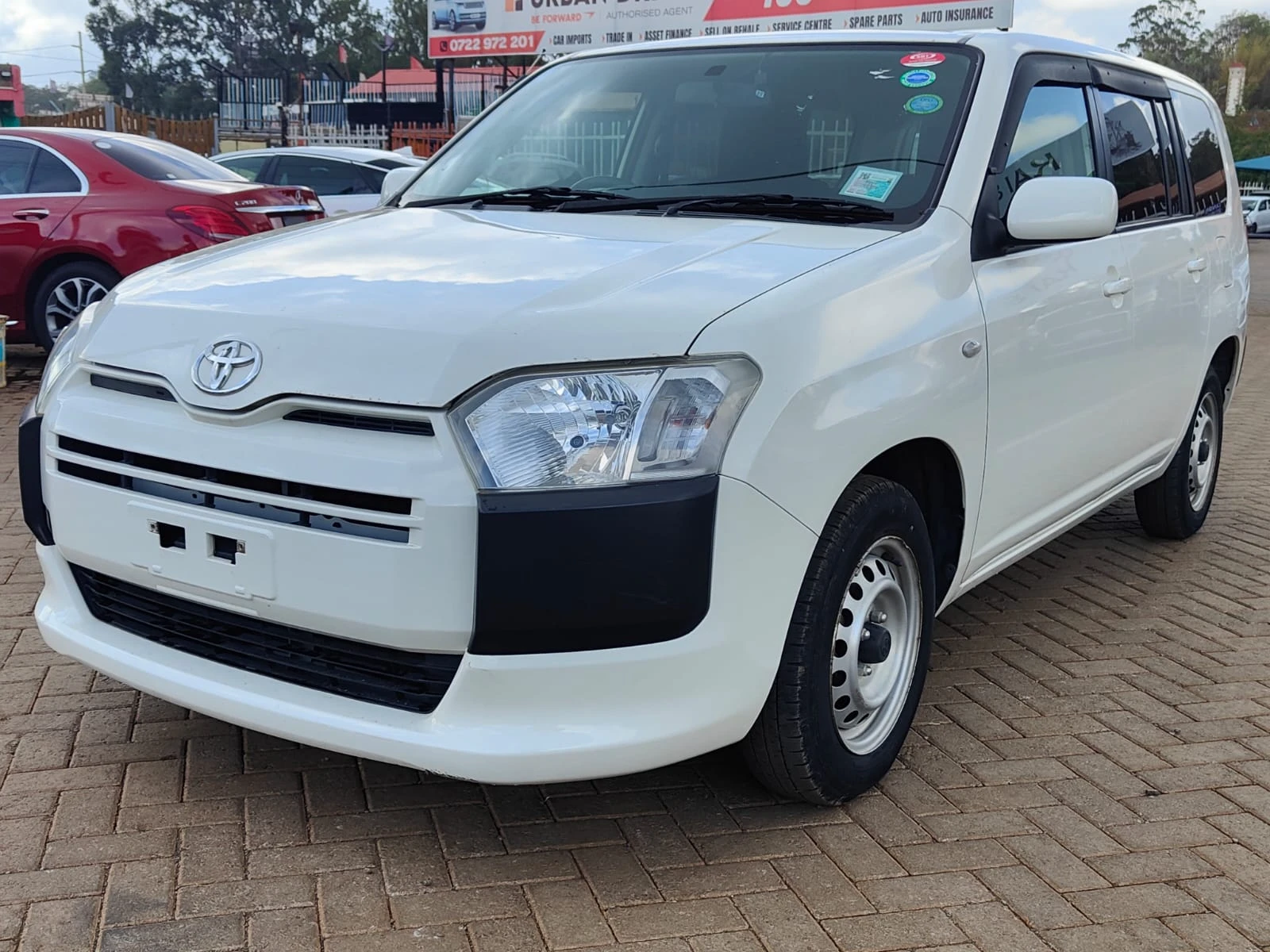 An image of the Toyota Probox in an auto dealership lot